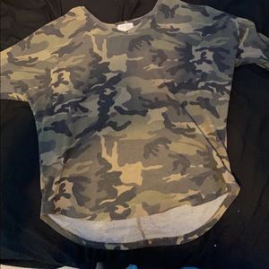 Camouflage shorter sleeves , slightly worn, no signs of wear.